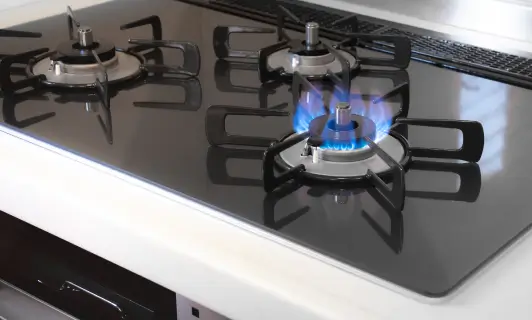 火がついたガスコンロの画像